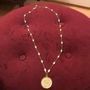 Snowflake coin stamped necklace